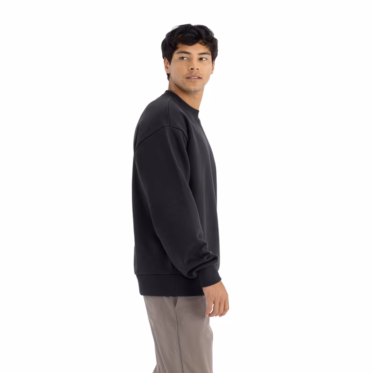Unisex Heavyweight Crewneck Sweatshirt — Black, worn